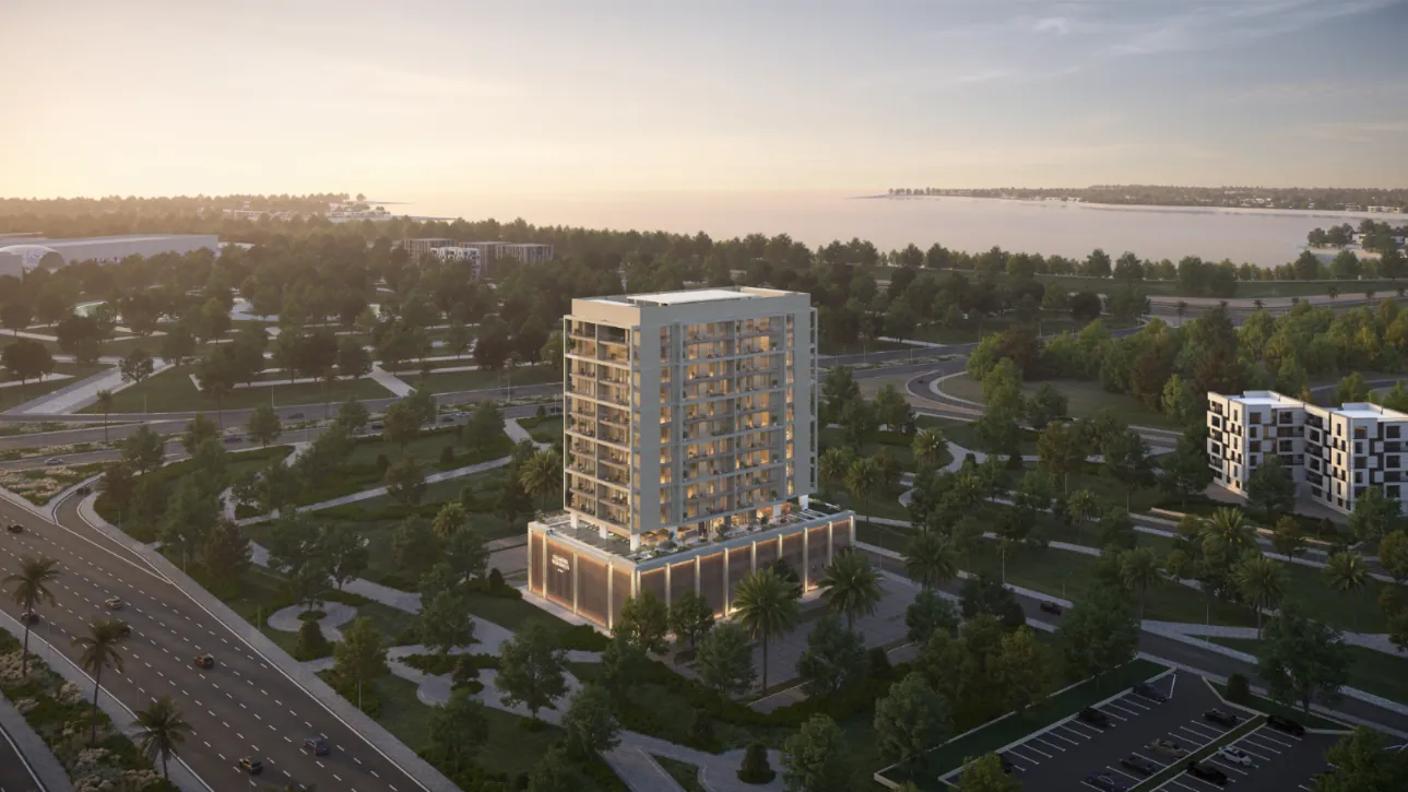 Aerial view of the tower at dusk with the sea beyond