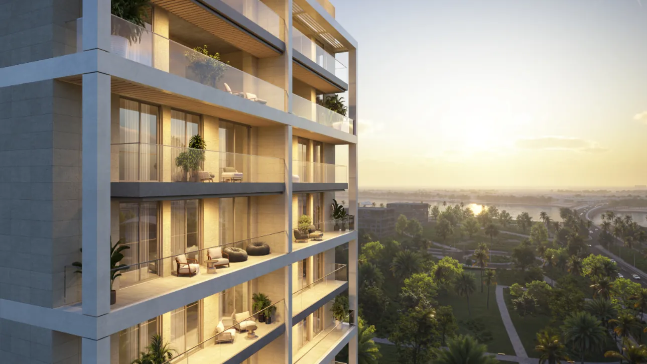 Balconies overlooking parkland at sunset